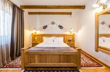 Фото номера Улучшенный двухместный номер с 1 кроватью Гостевой дом Dacii Liberi Resort and Spa г. Petrova 5